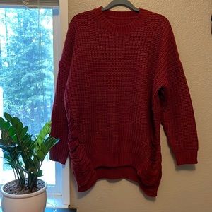 Big thick knit sweater! Burgundy color, size small with premade tears